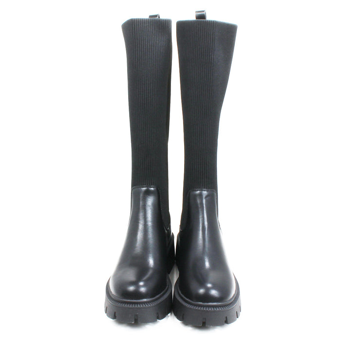 Emma Zane knee high boots. Chunky black soles, black leather feet with black elasticated leg shaft. Front view.