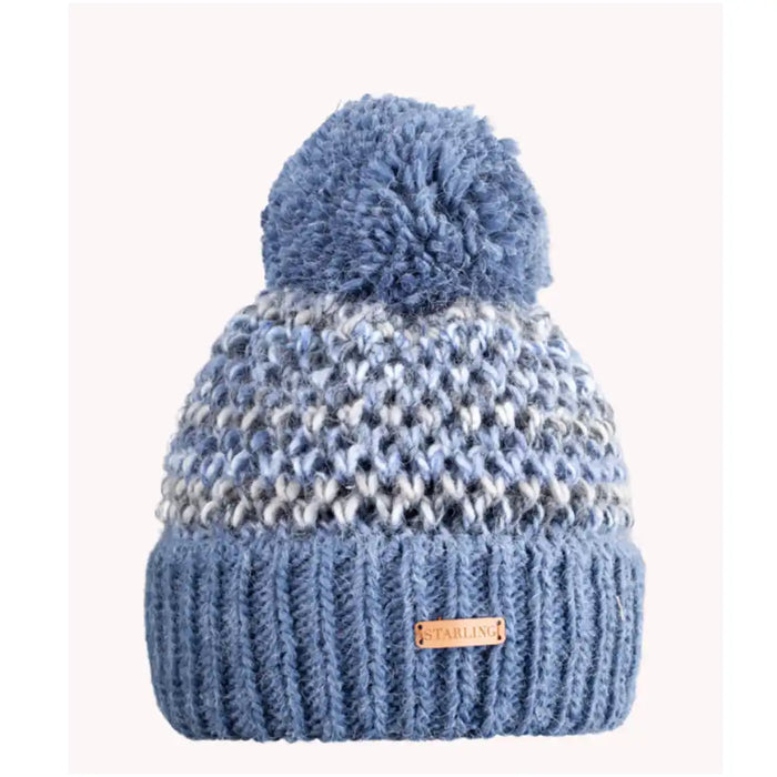Blue knitted beanie with pom-pom on a white background