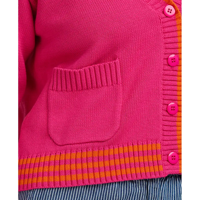 Close-up of a pink cardigan with orange stripes and buttons on a white background