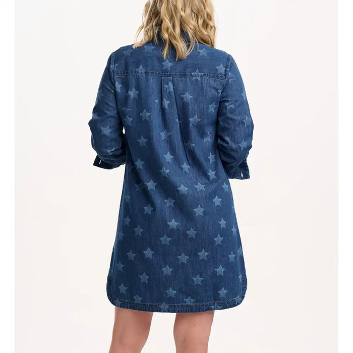 Blue denim dress with star pattern worn by a person on a white background