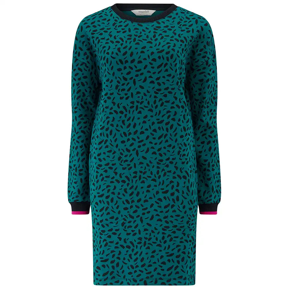 Teal dress with black pattern on a white background