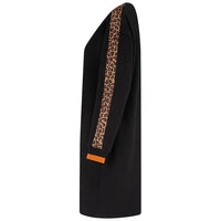 A black longline coat shown from the side, featuring a leopard print patterned stripe running down the sleeve and a small orange accent tab near the cuff.