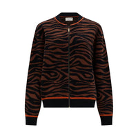 Brown and black tiger print bomber jacket in a white studio environment.