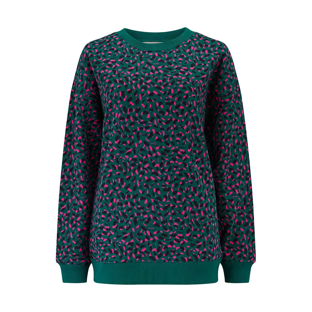 Green sweatshirt with pink pattern on a white background