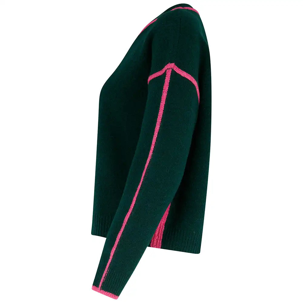 A dark green knit sweater with bright pink contrast stitching details along the neckline, shoulder, and sleeves, shown from a side profile view on a white background.