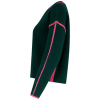 A dark green knit sweater with bright pink contrast stitching details along the neckline, shoulder, and sleeves, shown from a side profile view on a white background.