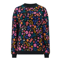 Colorful floral-patterned sweater on a white background