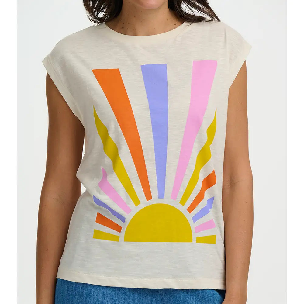 Person wearing a sleeveless top with a colorful sun design on a white background