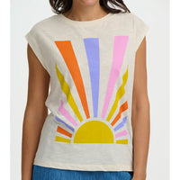 Person wearing a sleeveless top with a colorful sun design on a white background