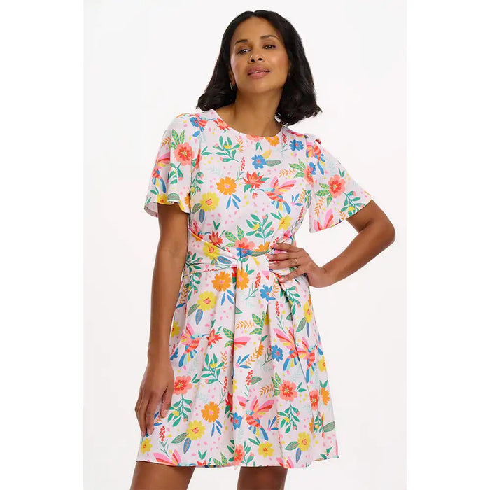 Woman wearing a floral dress on a white background