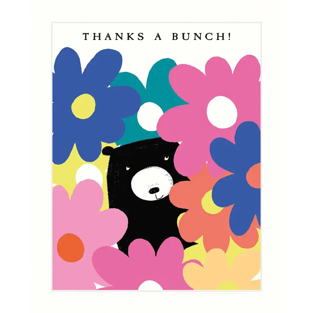 Artwork of large colourful flowers with a black bear looking out between them. Has the message 'Thanks a bunch!'