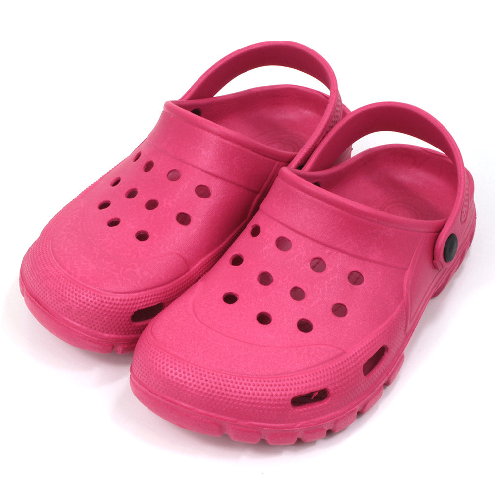 Urban Jack fuchsia pink rubber sandals. Holes for ventilation. Heel straps. Angled view. 