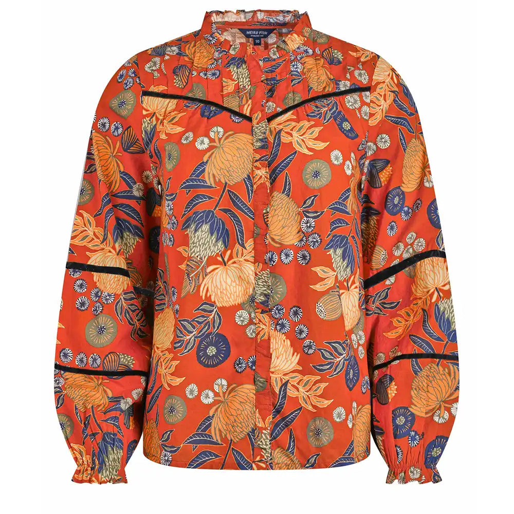 Floral patterned shirt with orange background on a white background