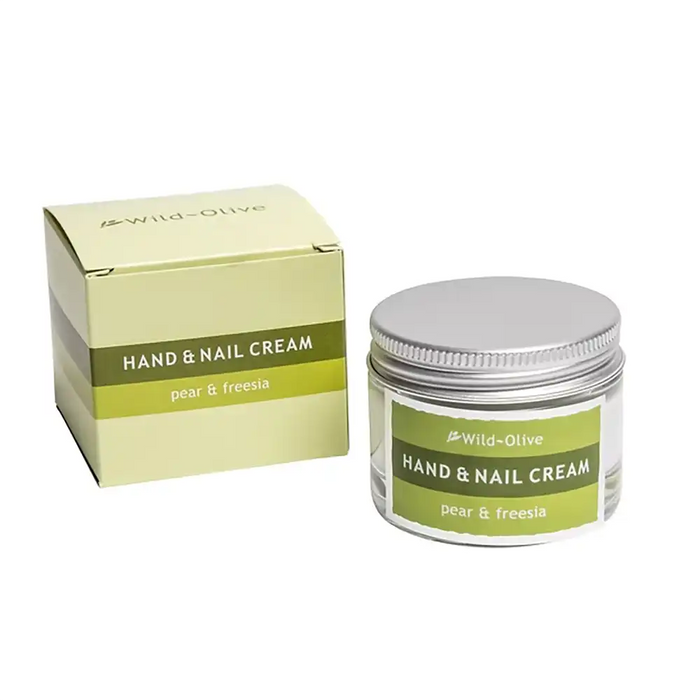 Wild-Olive Hand & Nail Cream in pear & freesia scent, shown as a clear jar with a silver lid next to its pale yellow-green box packaging on a white background.