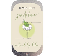 Wild-Olive Gin & Lime natural lip balm in a rectangular metal tin with rounded corners, featuring a cream label with green script and an illustration of a cocktail glass with a lime wedge.