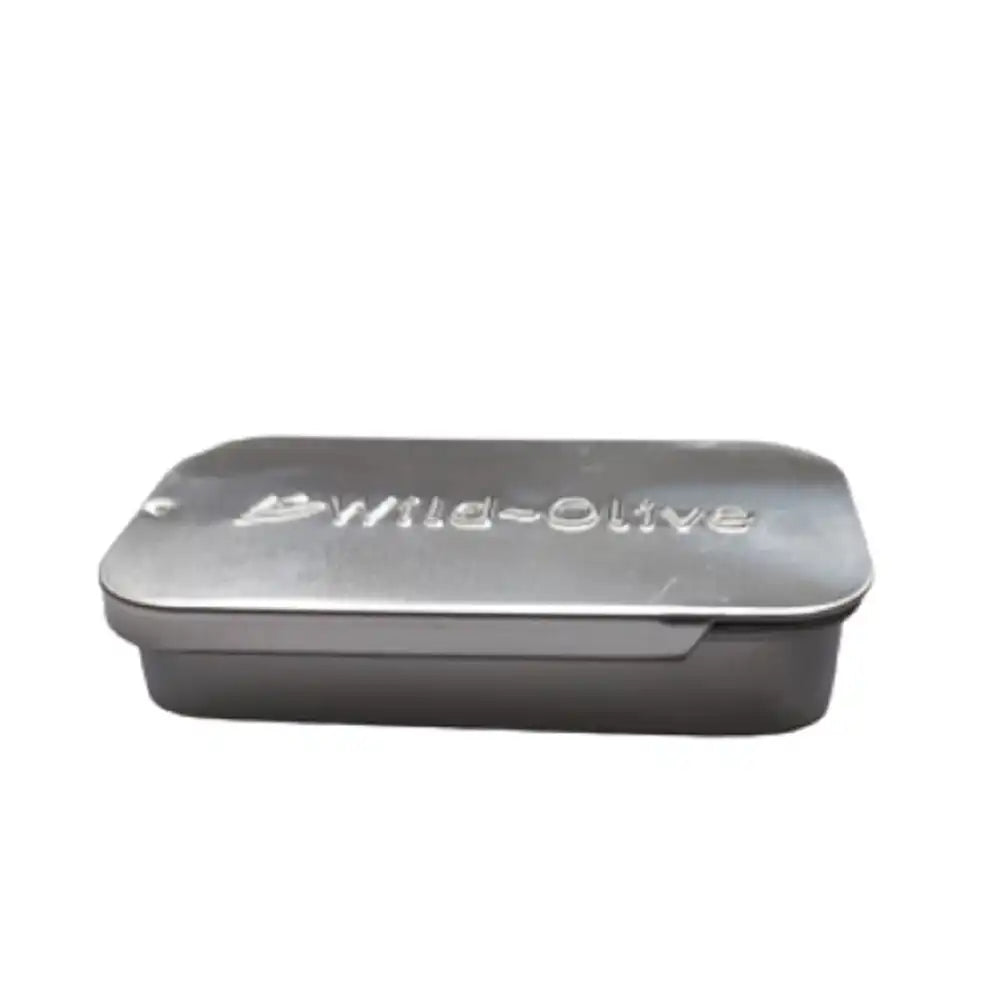 A rectangular metal tin with a fitted lid, shown on a plain white background. The lid has the brand name 'Wild-Olive' embossed on it.