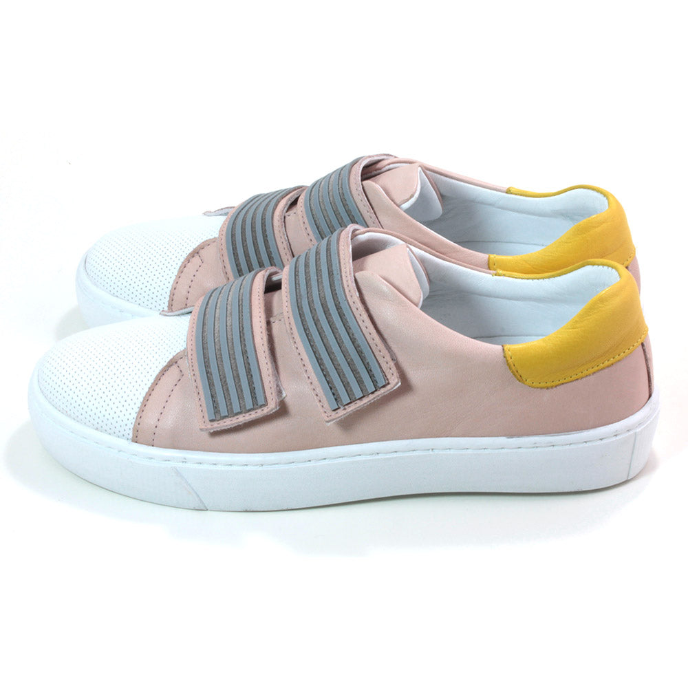 Adesso Nicole trainers in blush. White over toe and yellow at heel details. Velcro adjustment with two grey straps over the foot. Side view.