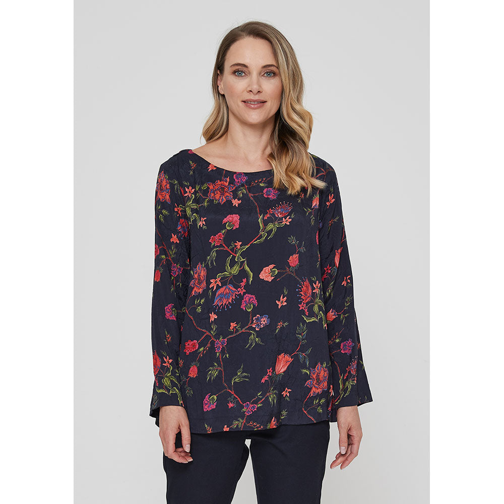 Adini Gracee top in red on black chintz print. Full length sleeves and round neckline. 