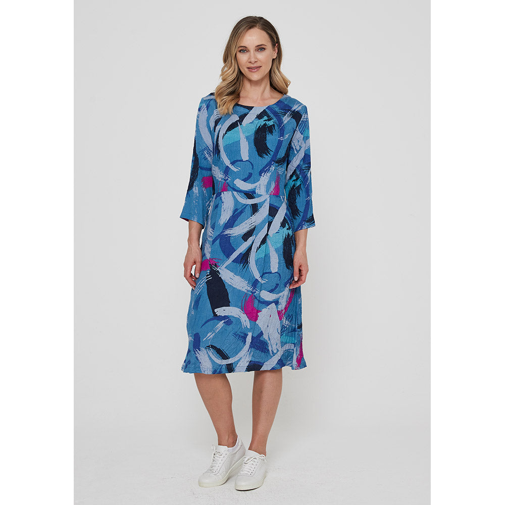 Adin Monet dress in blue with black, cerise and sky blue swashes of colour. Just over the knee length, three quarter length sleeves and a round neckline.