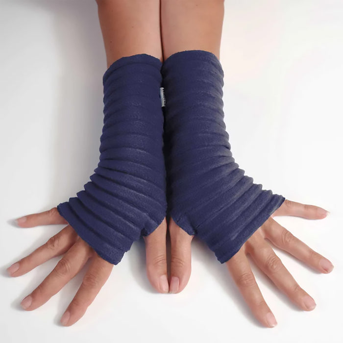 A pair of navy blue pleated fingerless gloves resting on a surface.