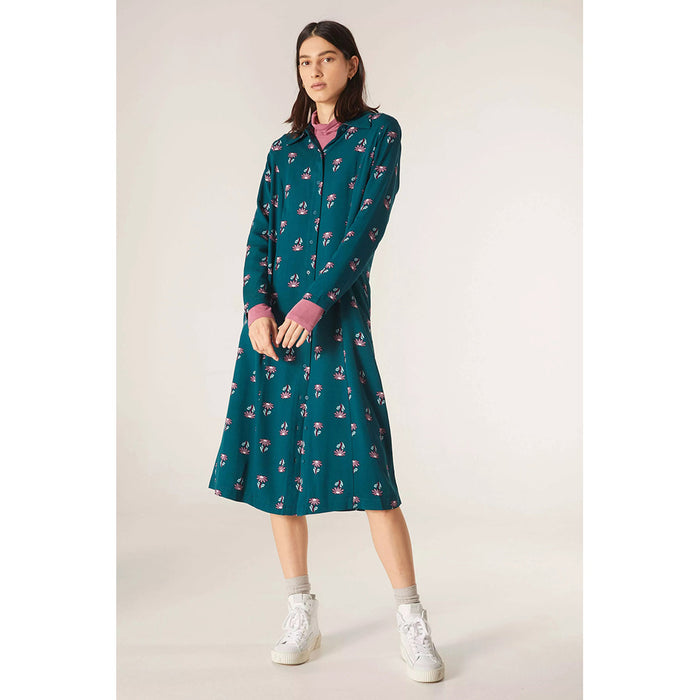 Compania Fantastica front fastening, long sleeved, midi length dress. Teal coloured with flowers pattern. Front view.