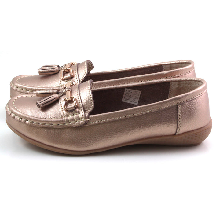 Jo and Joe Nautical bronze moccasin style leather flat shoes. Bronze stitching and bronze leather tassels. Side view