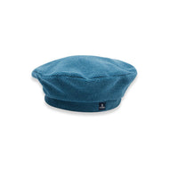 Bright blue beret. Brand logo on trim. Honey comb material. 