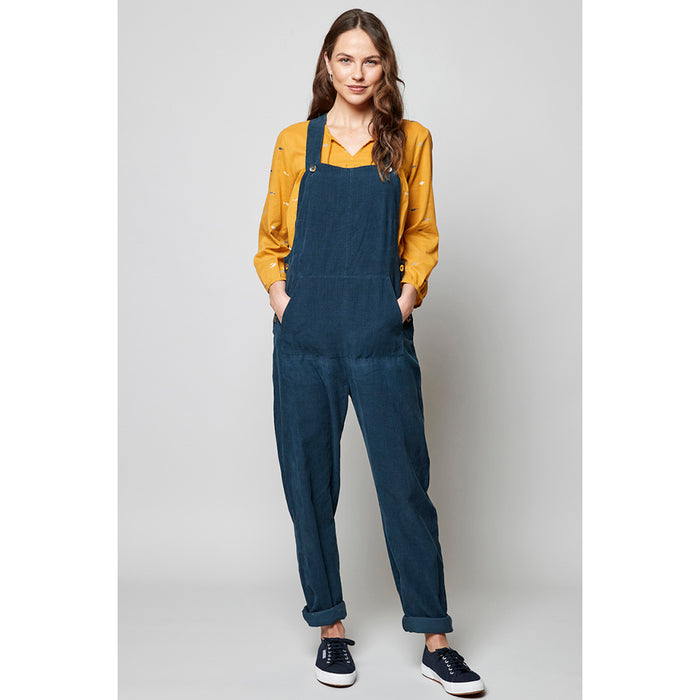 Nomads cord dark blue dungarees. Button fastening. Pockets and trouser turn-ups. Front view.