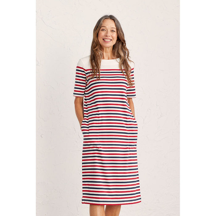 Seasalt Cornwall straight knee length dress with pockets. Blue, red and white horizontal stripes. White across shoulders and around neck. Front view.