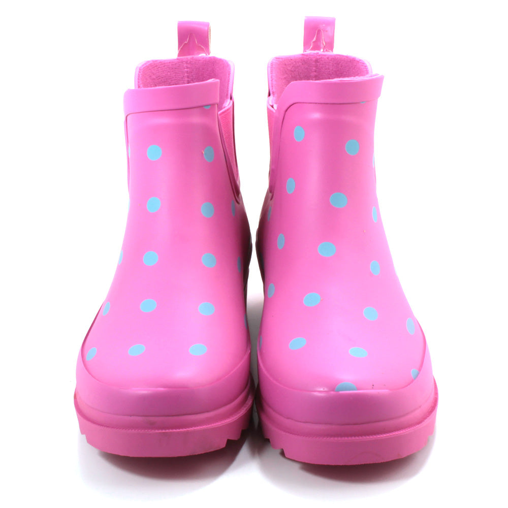 Urban Jack ankle wellingtons. Pink with grey spots. Fabric interior. Elasticated side gusset. Back pull on tabs. Front view.